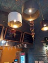 Krakow, Poland - October 19, 2019: Interior of Indian masala roll street food place with warm tone lighting from the light bulb in