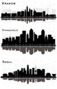 Krakow Poland, Seoul Korea and Minneapolis Minnesota USA City Skyline Silhouettes with Black Buildings and Reflections Isolated on Royalty Free Stock Photo