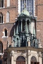 Facade of medieval gothic red brick St. Mary\'s Basilica at Main Square in the Old Town, Krakow, Poland