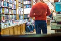 Krakow, Poland - September 25, 2023: Interior of a book store where people can be seen looking around browsing books to purchase