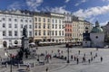Main Market Square with Church of St. Adalbert and statue of polish poet Adam Mickiewicz, Krakow, Poland