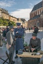 Krakow, Poland - September 23, 2018: nMen dressed in Polish uniforms from World War I among tourists at krakow`s main