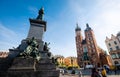 Sunshine view of monuments and ancient towers on the Krakow city central square