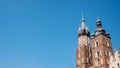 Krakow, Poland, St Mary`s Basilica towers, building, Main Market Square, Old Town. Clear blue sky landmark Royalty Free Stock Photo