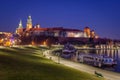 Krakow, Poland, Wawel Castle and Wawel cathedral over Vistula river in the night Royalty Free Stock Photo