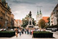 Krakow, Poland. Woman Guide Conducts A Tour For Schoolchildren N