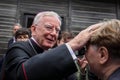 Krakow`s archbishop Marek Jedraszewski blessing the woman