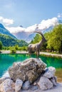 View at the Jasna Lake with Capricorn statue near Kranjska Gora Town in Slovenia