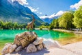 View at the Jasna Lake with Capricorn statue near Kranjska Gora Town in Slovenia