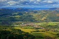 Krasnany town from Mala Fatra mountain. FView of the evening village from the mountains in Slovakia. Mountain forest with storm cl Royalty Free Stock Photo