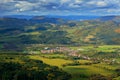 Krasnany town from Mala Fatra mountain. FView of the evening village from the mountains in Slovakia. Mountain forest with storm cl