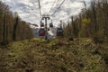 Krasnaya Polyana cable car / Gondola for climbing a mountain peak. Operation of lifting mechanisms. Security level. Russia Sochi