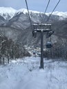 Krasnaya Polyana, Russia, February 14, 2020. Ski lift in the snowy mountains