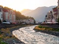 View of the Mzymta river and embankment at sunset in summer Royalty Free Stock Photo