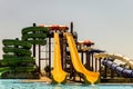 Long spiral and straight water slides in the outdoors seasonal water park