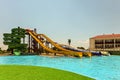 Long spiral and straight water slides in the outdoors seasonal water park