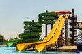 Long spiral and straight water slides in the outdoors seasonal water park