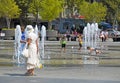 Happy children among the fountain on a hot day in Krasnodar Russia Royalty Free Stock Photo