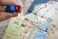 Throwing dices on maps of Prague Royalty Free Stock Photo
