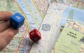 Throwing dices on maps of Prague Royalty Free Stock Photo