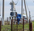 Electricians repair electrical transformer. Repair team on the road