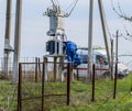 Electricians repair electrical transformer. Repair team on the road