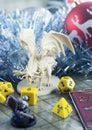 Playing Dungeons and Dragons. Dices, plastic figure of white dragon and rpg characters. Christ Royalty Free Stock Photo