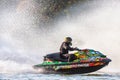 Jet ski racer drives watercraft and splashing while racing at South Russian Aquabike Royalty Free Stock Photo