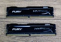 RAM Kingston Fury on a wooden table. RAM with a radiator. Overclocker RAM.