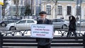 Elderly man with a poster in support of Navalny