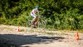 Cyclist riding a bike on the trail. Bicyclist riding a bicycle in country area