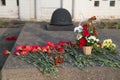 Red carnation flowers are laid on the gravestone of the Victory Memorial during the celebration of Victory Day Royalty Free Stock Photo