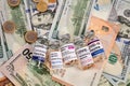 Covid Vaccine Vials - Photo on Money Bills