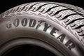 Krasnoyarsk, Russia, September 2019: Goodyear logo on the sidewall of a black tire close-up. world tire company Royalty Free Stock Photo