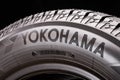 Krasnoyarsk, Russia, 20 September 2019: Yokohama logo of the Japanese tire company on the side of the tire, close-up on a black Royalty Free Stock Photo