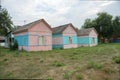 Wooden summer houses for tourists at the Iskra camp site in the village of Shushenskoye in the Krasnoyarsk Territory. Russia.