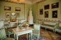 Krasny Dvur Chateau, North Bohemia, Czech Republic, 19 June 2021: Castle interior, rococo furniture in living room table with