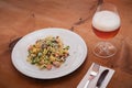 Krautfleckerl, Austrian pasta with caramelized cabbage, Served with Beer