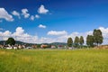 Kravare, Machuv kraj, Czech republic - July 14, 2018: czech summer landscape near Kravare village with meadow, football field, hou