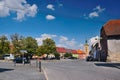 Kravare, Machuv kraj, Czech republic - July 14, 2018: intersection near the square with parked cars, historical houses and church