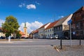 Kravare, Machuv kraj, Czech republic - July 14, 2018: intersection near the square with parked cars, historical houses and church