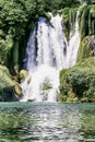 Kravice waterfall on the Trebizat River in Bosnia and Herzegovina.  Miracle of Nature in Bosnia and Herzegovina. The Kravice water Royalty Free Stock Photo