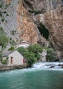 Situated below a massive cliff at the source of the Buna River, Blagaj tekija represents an Ottoman religious structure--one that