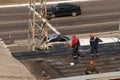 Kremenchug, Poltava region, Ukraine, April, 2019, repair of the old roof of the building, the roof is covered with new ruberoid Royalty Free Stock Photo