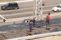 Kremenchug, Poltava region, Ukraine, April, 2019, repair of the old roof of the building, the roof is covered with new ruberoid Royalty Free Stock Photo