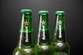 Cold bottle of Heineken Lager Beer with drops on dark background Royalty Free Stock Photo