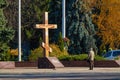 Kremenchuk city, Ukraine - November 1, 2022: Christian large cross with the image of Jesus on the site of the former temple