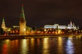 Kremlevskaya embankment on a background of Moskva river and Moscow Kremlin at night Royalty Free Stock Photo