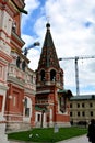 Kremlin against the sky from the bottom rear cranes