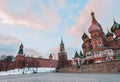 Kremlin in Moscow, St. Basil`s Cathedral on red square at sunset in winter Royalty Free Stock Photo